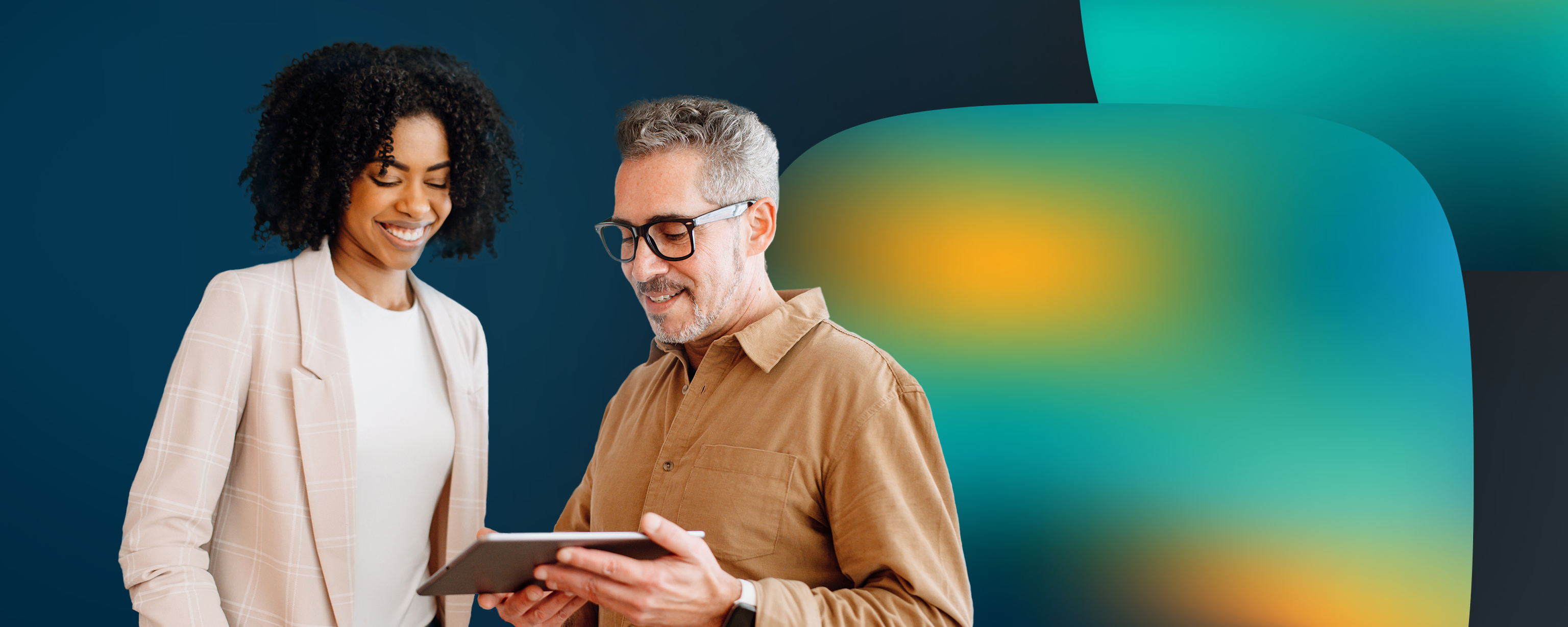 two people reading the 2026 Canada Salary Guide